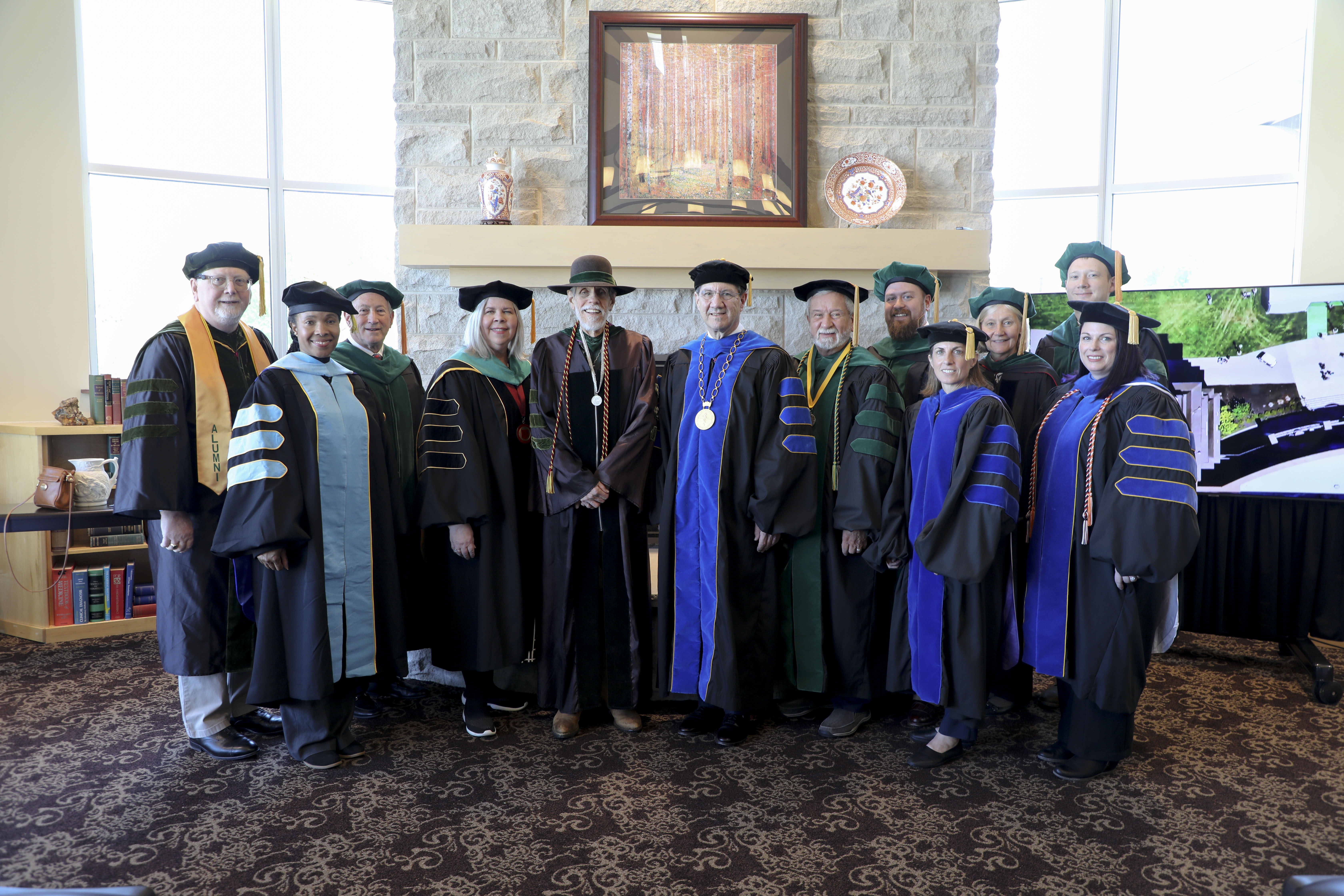 Members of WVSOM platform party at 2023 Graduation lined up in the president's lounge.