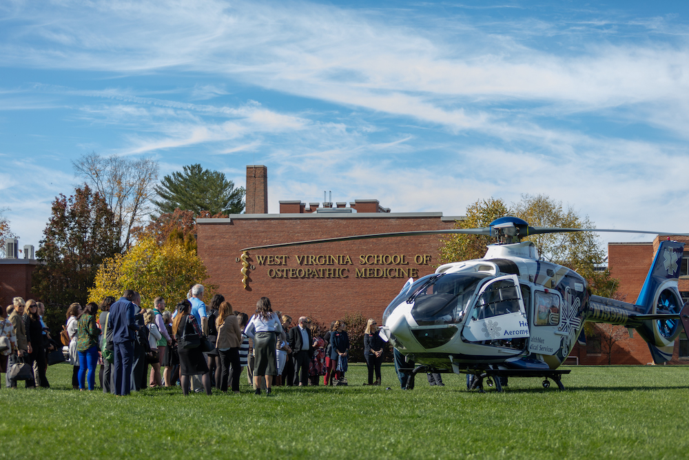 The 2023 class of Leadership WV visited the WVSOM campus Oct. 26 for tours and presentations. The campus tour started with HealthNet Aeromedical Services landing a helicopter on the campus parade field for a presentation on HealthNet’s services and operation. 