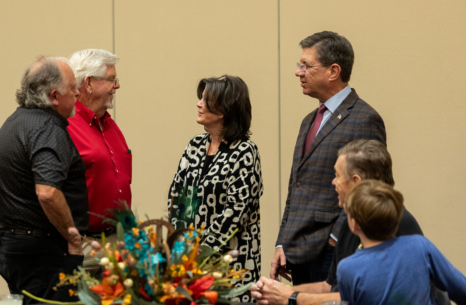 WVSOM President James W. Nemitz, Ph.D., and his wife, Nancy Bulla Nemitz, talk with guests