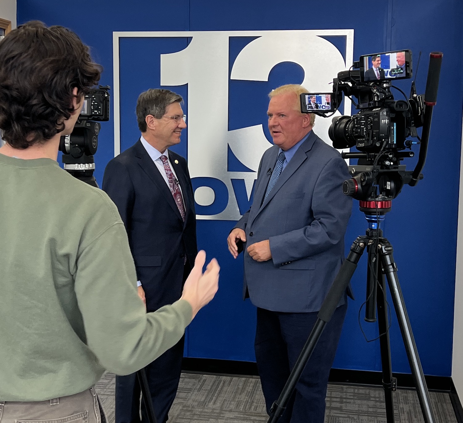 WVSOM President James Nemitz stands with Mark Curtis, host of WOWKTV's "Inside West Virginia Politics" to do a TV interview about the WVSOM Pre-Osteopathic Medicine Program.