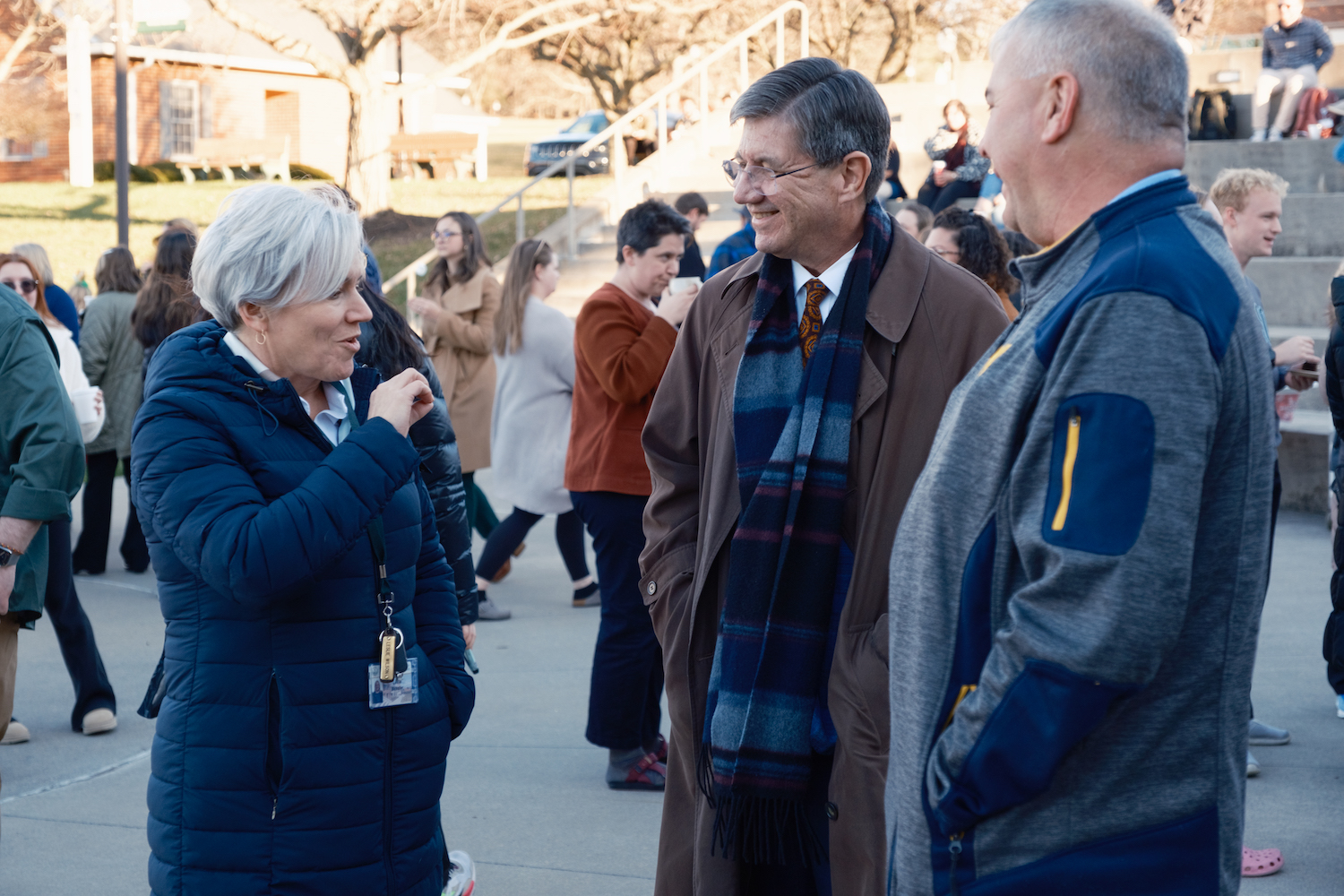 Three people talk at the holiday kickoff. President James Nemitz, Ph.D, talks with, from left, Leslie Bicksler, MWS, vice president of human resources, and Jeff Dowdy, assistant director of campus services. 
