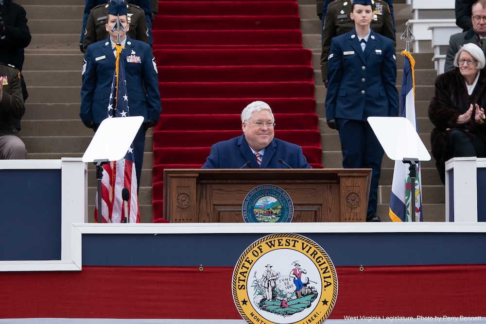 Man stands at a podium