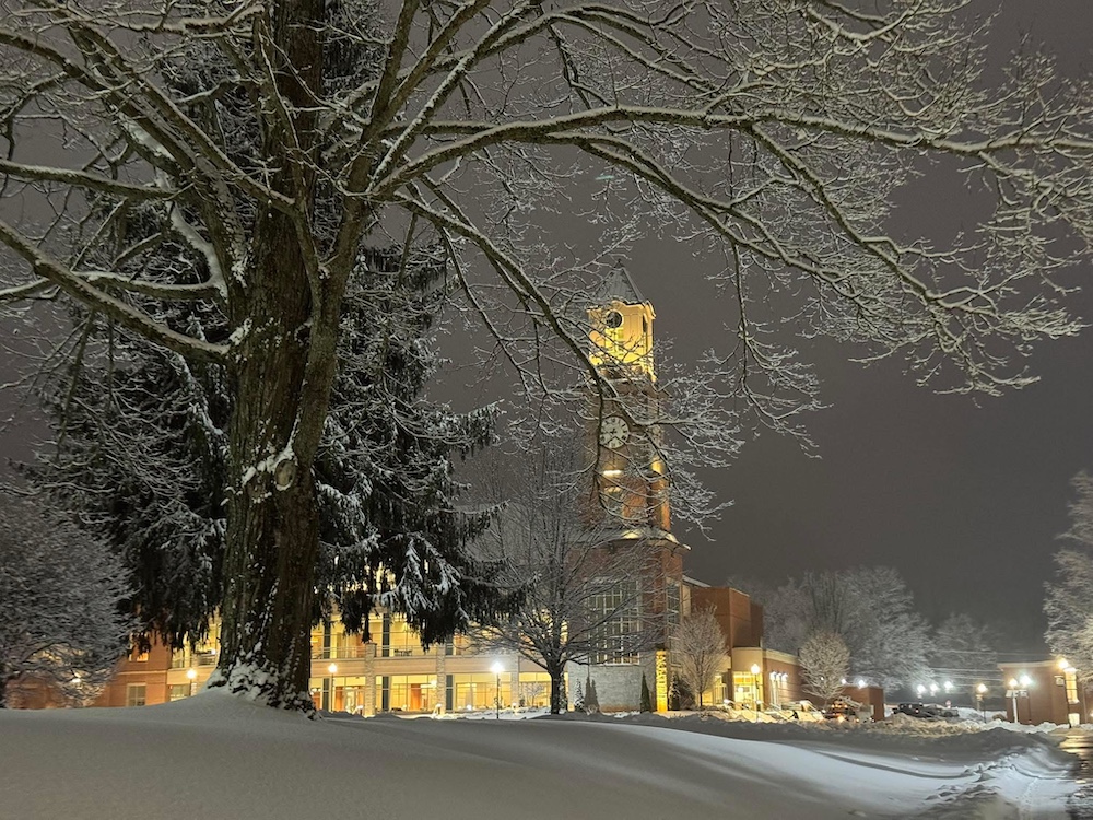 Photo of WVSOM building at night in the winter