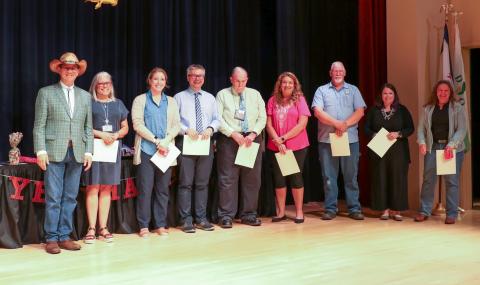 WVSOM President James W. Nemitz, Ph.D., recognizes a line of employees during the annual Employee Celebration for their years of service.