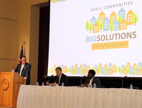 West Virginia House of Delegates Roger Hanshaw, R-Clay, and House Minority Leader Delegate Sean Hornbuckle, D-Cabell, seated, answer questions from moderator Bowles Rice Attorney Richie Heath.