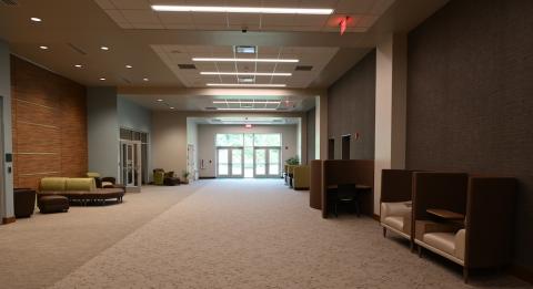 Large open room with an exit in the middle.