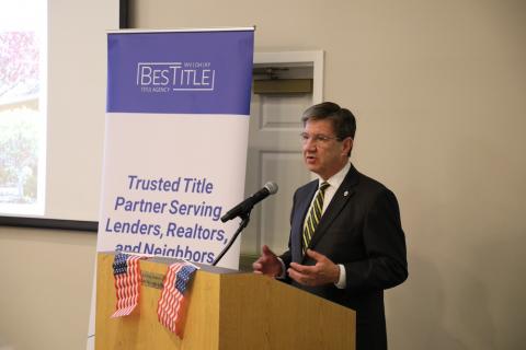 Man speaking at podium