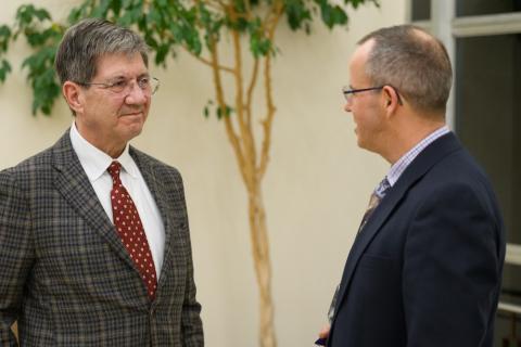 Two men talking